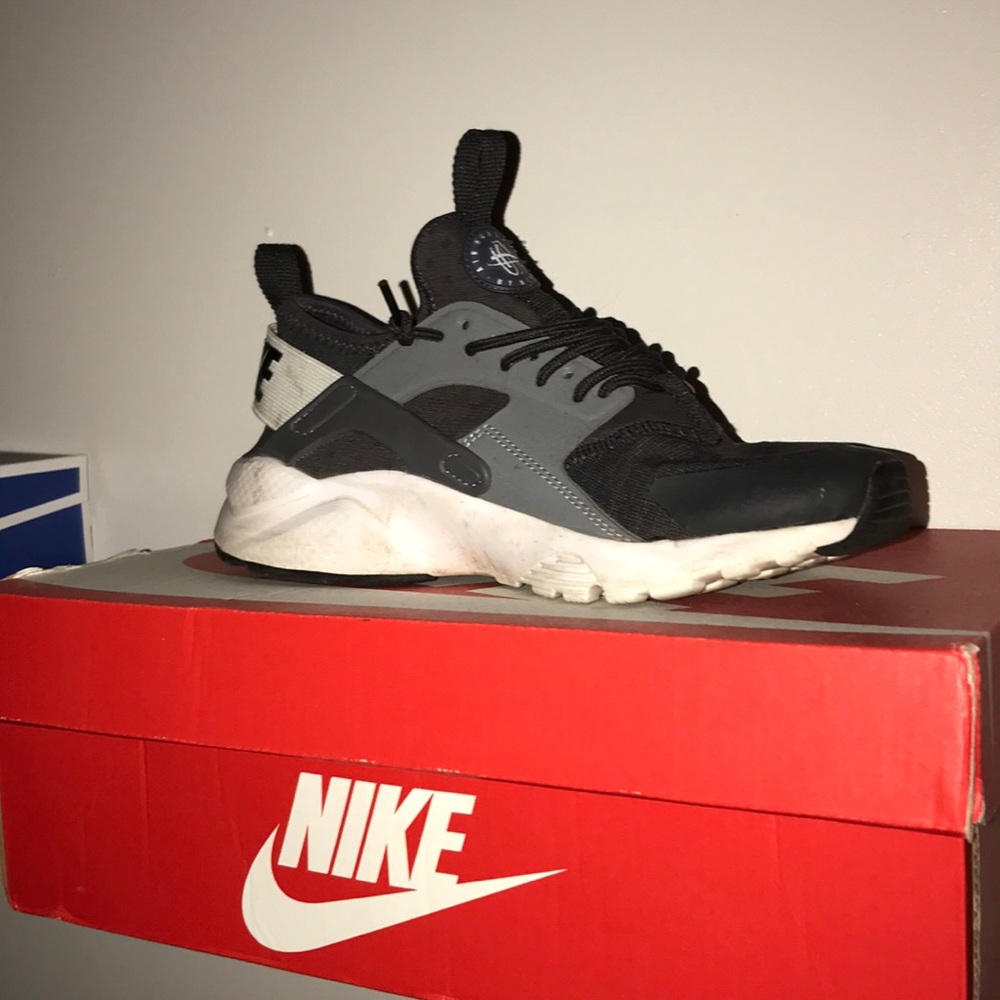 Black and grey Nike shoes